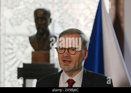 Prague, Czech Republic. 30th May, 2024. Prime Minister of the Czech Republic Petr Fiala seen during a press conference. NATO Secretary General Jens Stoltenberg visits Prague before the beginning of the Informal meeting of NATO Ministers of Foreign Affairs meeting with Czech Prime Minister Petr Fiala. Jens Stoltenberg and Petr Fiala also discussed the Czech ammunition initiative, situation in Ukraine and Czech cooperation in NATO. (Photo by Tomas Tkacik/SOPA Images/Sipa USA) Credit: Sipa USA/Alamy Live News Stock Photo