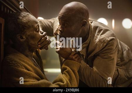 A Quiet Place: Day One (2024) directed by Michael Sarnoski and starring Lupita Nyong'o and Djimon Hounsou. Hear how it all began and experience the day the world went quiet. Publicity photograph ***EDITORIAL USE ONLY***. Credit: BFA / Gareth Gatrell / Paramount Pictures Stock Photo