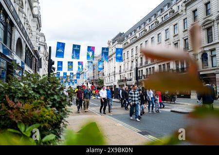 London, UK. 30th May, 2024. People walk at the Champions Festival on Regent Street in central London. The Champions League final between Dortmund and Real Madrid will take place at Wembley Stadium on Saturday, June 1. Credit: Tom Weller/dpa/Alamy Live News Stock Photo