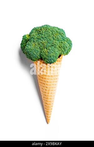 Broccoli in ice cream cone isolated on white background. Trendy concept of vegetarianism, vegan food and green vegetable proper nutrition. Stock Photo