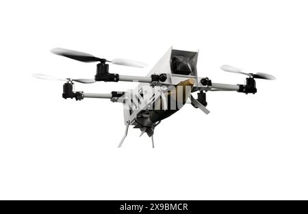 Isolated military drone with aerial bomb in motion. Defense technology. Stock Photo