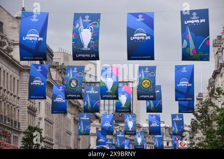 London, UK. 30th May, 2024. Banners decorate Regent Street during the Champions League Festival ahead of the final match. Borussia Dortmund will face off with Real Madrid at Wembley Stadium on 1st June. (Credit Image: © Vuk Valcic/SOPA Images via ZUMA Press Wire) EDITORIAL USAGE ONLY! Not for Commercial USAGE! Stock Photo