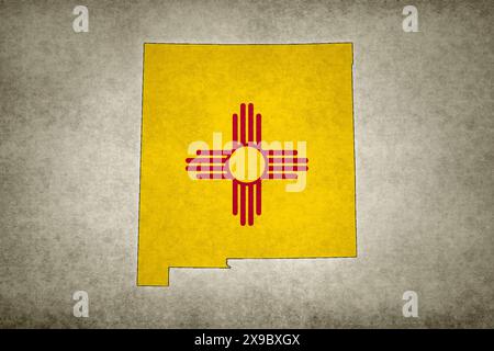 Grunge map of the state of New Mexico (USA) with its flag printed within its border on an old paper. Stock Photo