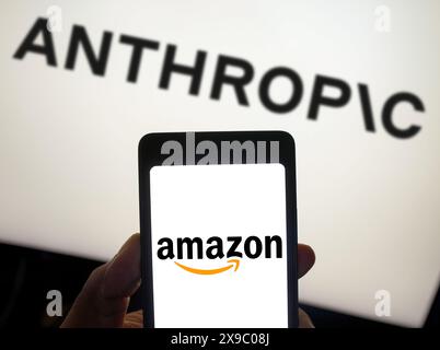 Brazil. 29th May, 2024. In this photo illustration, the Amazon logo is displayed on a smartphone screen and Anthropic logo background. (Credit Image: © Rafael Henrique/SOPA Images via ZUMA Press Wire) EDITORIAL USAGE ONLY! Not for Commercial USAGE! Stock Photo