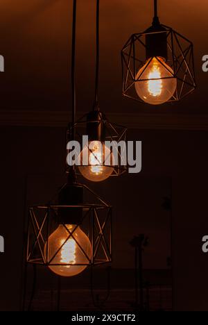 Low light photo of lightbulb filament Stock Photo