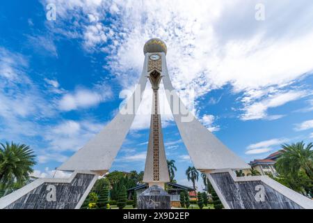 Dataran Ipoh, Perak - May 31, 2024 : Horizontal view of white clock tower monument with blue sky at Dataran Ipoh Stock Photo