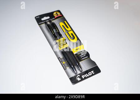 A sealed pack of Pilot G2 Black Ink pen on white background. Stock Photo