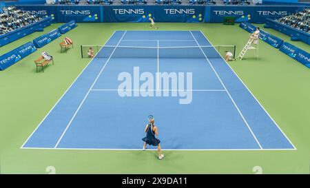 Sports TV Broadcast of Female Tennis Championship Match Full Set. Two Professional Women Athletes Compete, Hit Fault Shot. Network Channel Television With Audience. High Angle View. Stock Photo