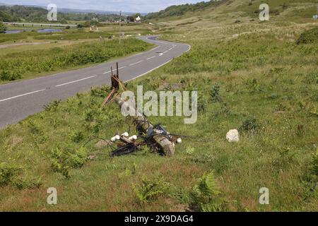 A roadside casualty of a driving accident with a heavy vehicle having hit a telegraph pole and snapped it knocking the top part over. Stock Photo