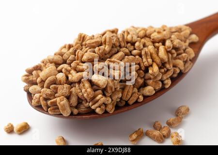 Roasted kamut on white background Stock Photo