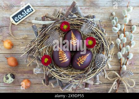 easter eggs with leaf ornament  coloured with onion skin Stock Photo