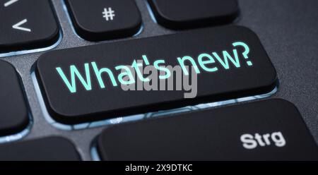 Illuminated keyboard with a labeled key - Whats new Stock Photo