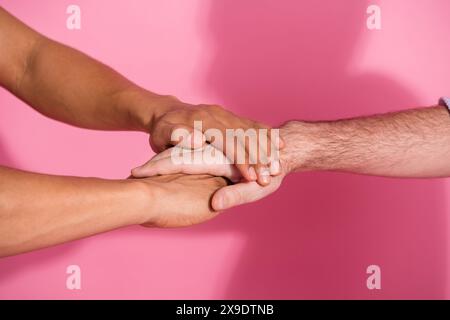 Photo of diverse many people put hands stack team building concept isolated pastel color background Stock Photo