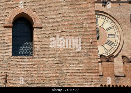 Piazza Maggiore is the heart of Bologna with the marbles of the basilica of San Petronio, Palazzo d'Accursio, Palazzo  Podestà, the Neptune fountain Stock Photo