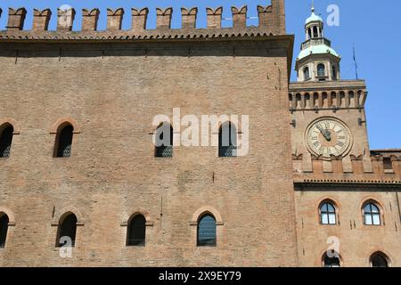 Piazza Maggiore is the heart of Bologna with the marbles of the basilica of San Petronio, Palazzo d'Accursio, Palazzo  Podestà, the Neptune fountain Stock Photo