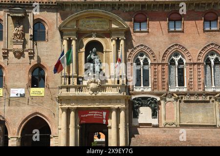 Piazza Maggiore is the heart of Bologna with the marbles of the basilica of San Petronio, Palazzo d'Accursio, Palazzo  Podestà, the Neptune fountain Stock Photo