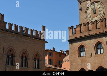 Piazza Maggiore is the heart of Bologna with the marbles of the basilica of San Petronio, Palazzo d'Accursio, Palazzo  Podestà, the Neptune fountain Stock Photo