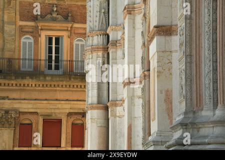 Piazza Maggiore is the heart of Bologna with the marbles of the basilica of San Petronio, Palazzo d'Accursio, Palazzo  Podestà, the Neptune fountain Stock Photo