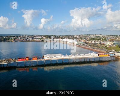 Aerial image of Paignton Sea Front showing the beach and the Pier stretching out to sea. Stock Photo