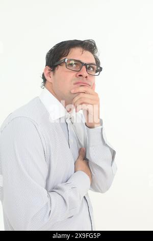 shy and insecure male nerd wearing glasses on white background Stock ...