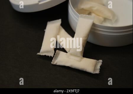 Packaging and nicotine pads on a dark background. Stock Photo