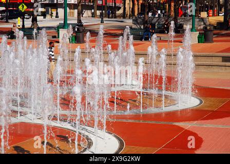 Water fountains spout in the shape of Olympic Rings at Olympic Park in Atlanta Stock Photo