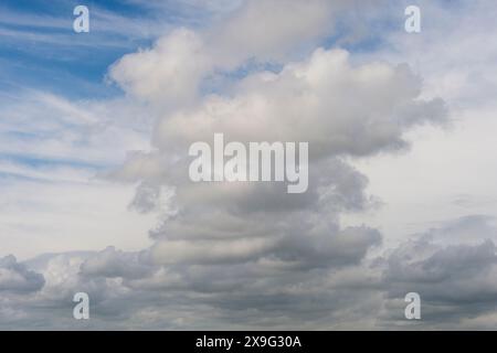 white whispy clouds and blue sky cloudscape Stock Photo