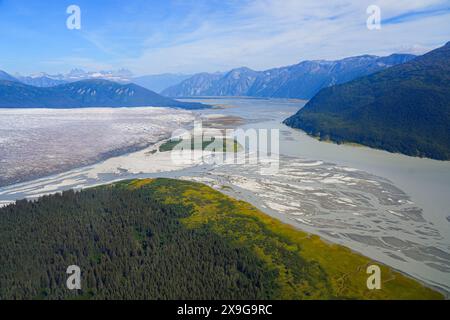 Aerial view of the glaciers located along the Taku Inlet, which are part of the Juneau Icefield in Alaska, USA - Floodplain covered with moraine surro Stock Photo