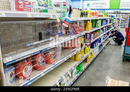 Miami Beach Florida,Walgreens Pharmacy drugstore,inside interior shelves display sale,laundry detergent Tide,under lock and key locked,security shopli Stock Photo