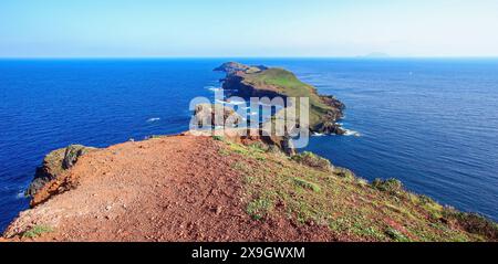 Lighthouse of the Ponta de São Lourenço (tip of St Lawrence) on a desertic islet seen from the Ponta do Furado viewpoint at the easternmost point of M Stock Photo