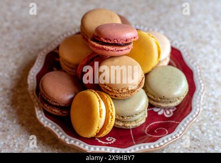 Pile of colorful macarons on a pretty plate Stock Photo