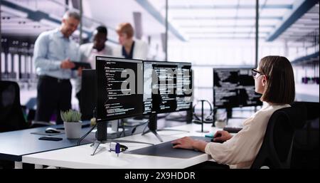 Software Engineer Developer Using Desktop Computer. Coding On PC Stock Photo