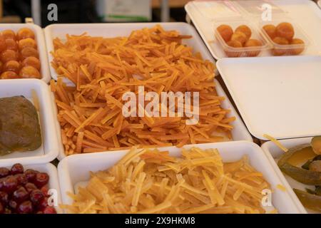 Dried fruits at market stall Stock Photo