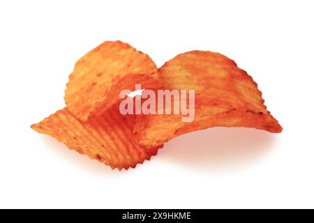 Grooved potato chips close up isolated on white background Stock Photo