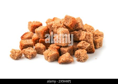 Salted rye bread crackers in bulk on a white background Stock Photo