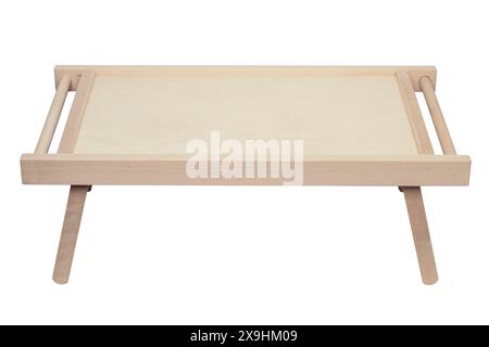 Wooden folding tray table for the convenience of eating in bed isolated on a white background Stock Photo
