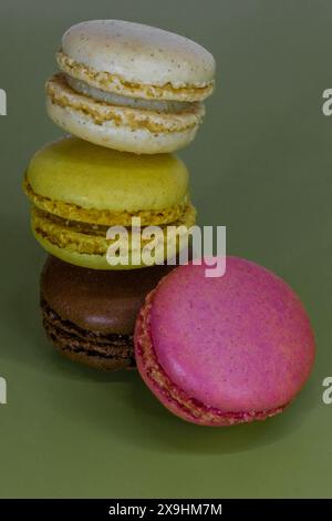 colorful macaroons on a wooden table Stock Photo