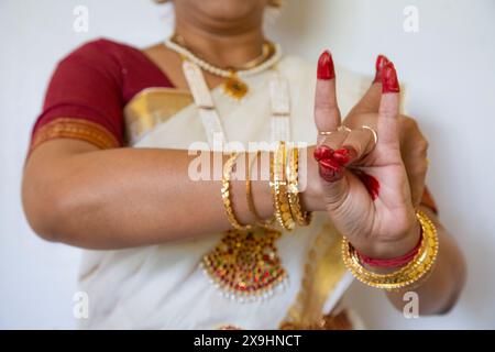 Bharatanatyam Indian classical dance mudra (pose) demonstrated by woman Indian classical dancer. Stock Photo