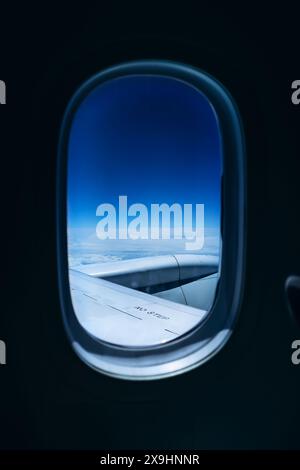 View from an airplane window during flight Stock Photo