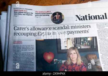 'Carer's allowance scandal: ministers recouping £251m in overpayments' Guardian newspaper headline DWP government article 18 May 2024 London UK Stock Photo
