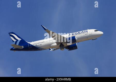 Barcelona, Spain - May 19, 2024: Aegean Airlines Airbus A320neo with FC Barcelona Women Team livery taking off from El Prat Airport in Barcelona, Spai Stock Photo