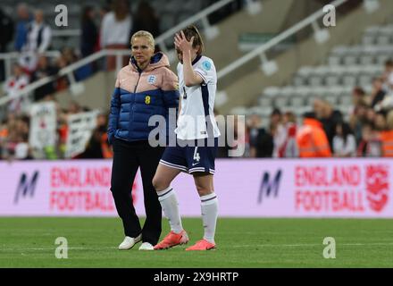 Newcastle Upon Tyne, UK. 31st May, 2024. Sarina Wiegman coach of England and Keira Walsh after the UEFA Women's European Qualifier match between England Women and France Women at St. James' Park, Newcastle Upon Tyne. Picture credit should read: Nigel Roddis/Sportimage Credit: Sportimage Ltd/Alamy Live News Stock Photo