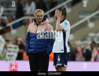 Newcastle Upon Tyne, UK. 31st May, 2024. Sarina Wiegman coach of England and Keira Walsh after the UEFA Women's European Qualifier match between England Women and France Women at St. James' Park, Newcastle Upon Tyne. Picture credit should read: Nigel Roddis/Sportimage Credit: Sportimage Ltd/Alamy Live News Stock Photo