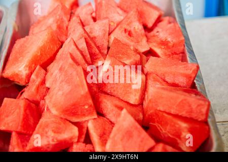 Full frame shot of watermelon slices in tray Stock Photo