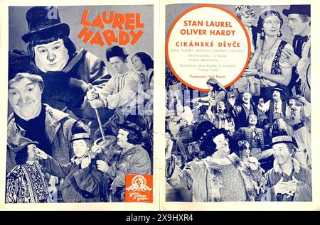 Czech Trade Ad for STAN LAUREL and OLIVER HARDY ANTONIO MORENO DARLA HOOD and MAE BUSCH in THE BOHEMIAN GIRL / CIKANSKE DEVCE 1936 directors JAMES W. HORNE and CHARLEY ROGERS from the opera by Michael William Balfe Hal Roach Studios / Metro Goldwyn Mayer (MGM) Stock Photo
