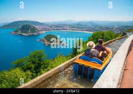 Fairground atraction and overview of the city. Monte Igueldo, San Sebastian, Spain. Stock Photo