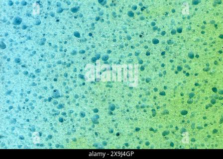 industrial background of pale green foam rubber Stock Photo