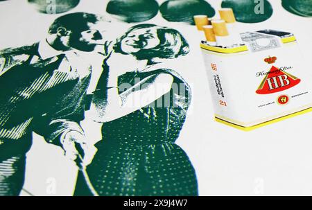 Viersen, Germany - May 9. 2024: Old german retro magazine HB cigarettes advertsing with young couple smoking on party from 1965 Stock Photo