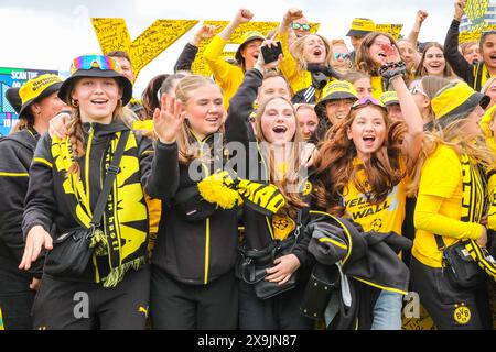 London, UK. 01st June 2024. The Borussia Dortmund Under-17 women's teams celebrate at the fan site. The official Borussia Dortmund fan park in Hyde Park gets busy with football fans. Around 20,000 are expected at the site, by 12 noon today, nearly 15,000 had already arrived to sing, party, enjoy the stage programme and later giant screens. The UEFA Champions League Final between Real Madrid and Borussia Dortmund will kick off at 8pm GMT at Wembley Stadium today. Credit: Imageplotter/Alamy Live News Stock Photo
