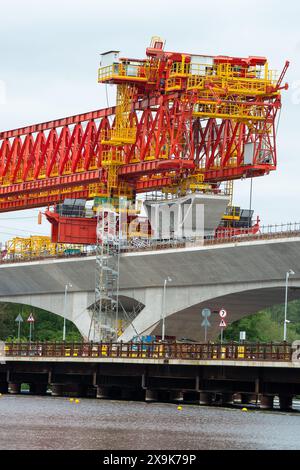 Harefield, UK. 1st June, 2024. HS2 are continuing work on the High Speed Rail 2 Colne Valley Viaduct in Harefield, London Borough of Hillingdon. The huge orange bridge building machine, Dominique, called a launching girder has now crossed over the  Grand Union Canal in Harefield and work on the viaduct is continuing above the lake (pictured) that used to house the Hillingdon Outdoor Activities Centre (HOAC). The Club were evicted by HS2 and remain without premises. Credit: Maureen McLean/Alamy Live News Stock Photo